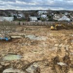 The hidden costs of not dealing with asbestos-contaminated land